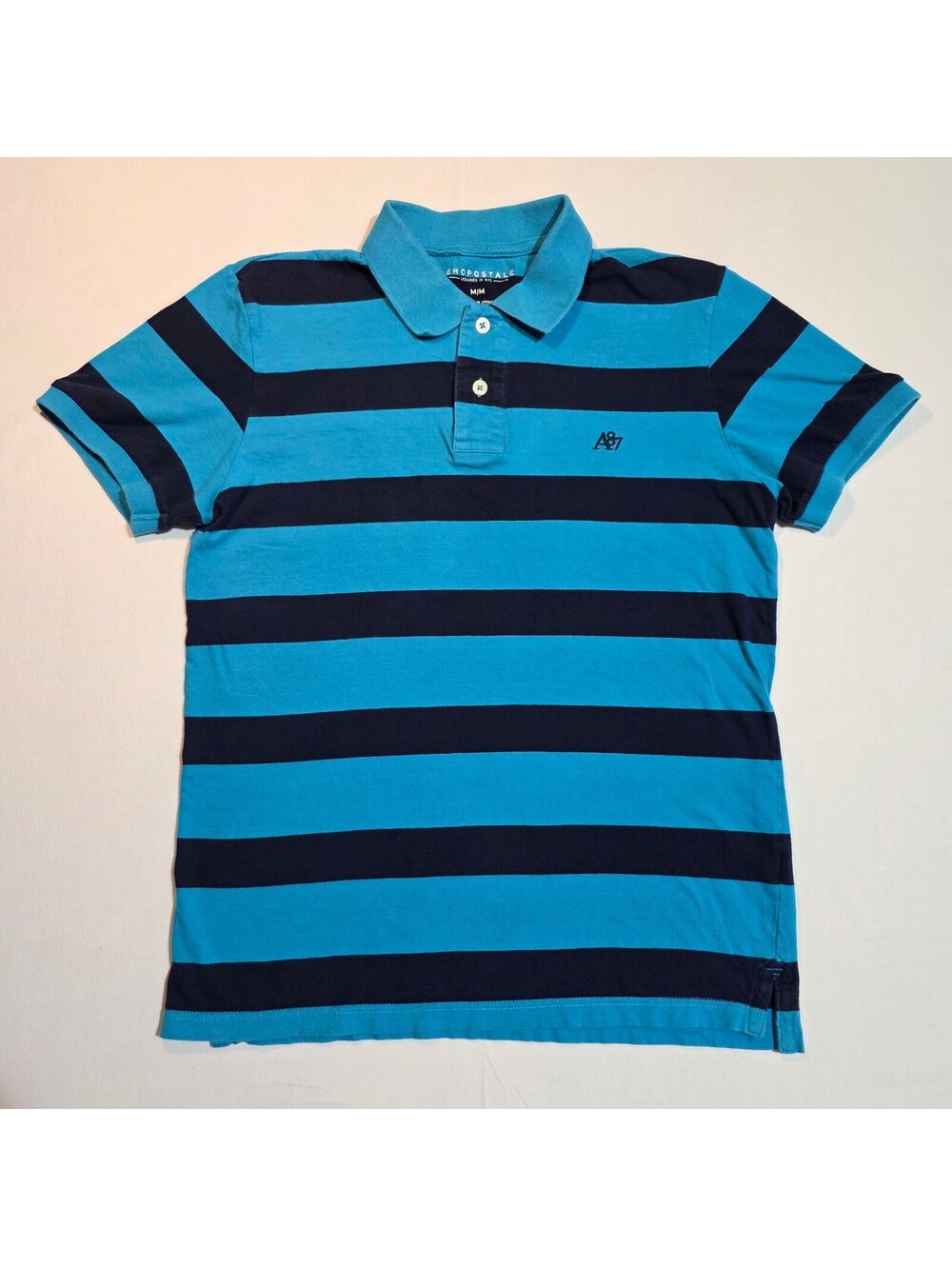 Aeropostale Men's Medium Blue and Navy Striped Polo Shirt